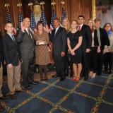 Picture of Representative Moolenaar with family and friends, taking the Oath of Office with Speaker John Boehner