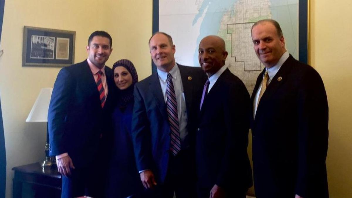 Photo of Representatives Moolenaar & Kildee With the Hekmati Family and Montel Williams